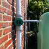 Bovengrondse Watertank 3000 Liter gekoppeld aan waterfilter