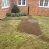 Septische put Nordic geplaatst in tuin met deksel ter hoogte van maaiveld
