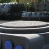 platte-kunststof-regenwaterput-7500-liter-mangat-en-aansluiting